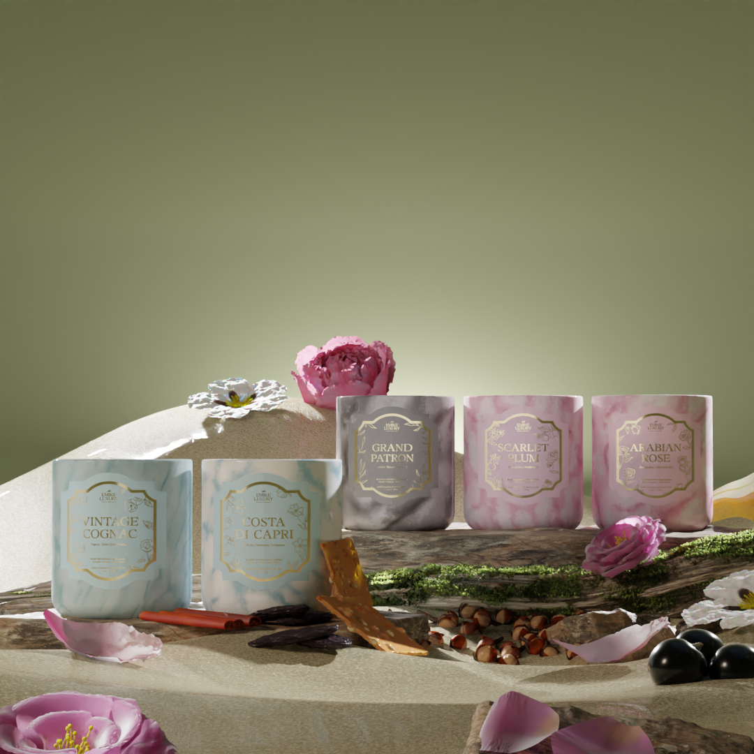 Set of candles with decorative elements on a wooden surface against a green background